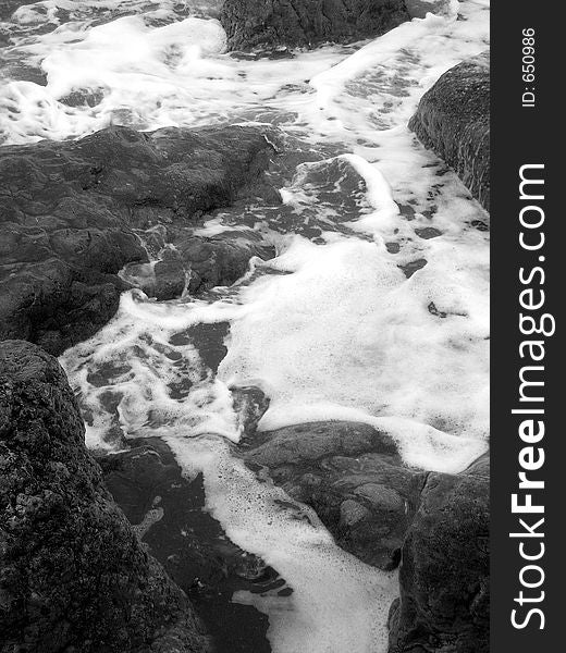 Surf and rocks on the seashore. Surf and rocks on the seashore