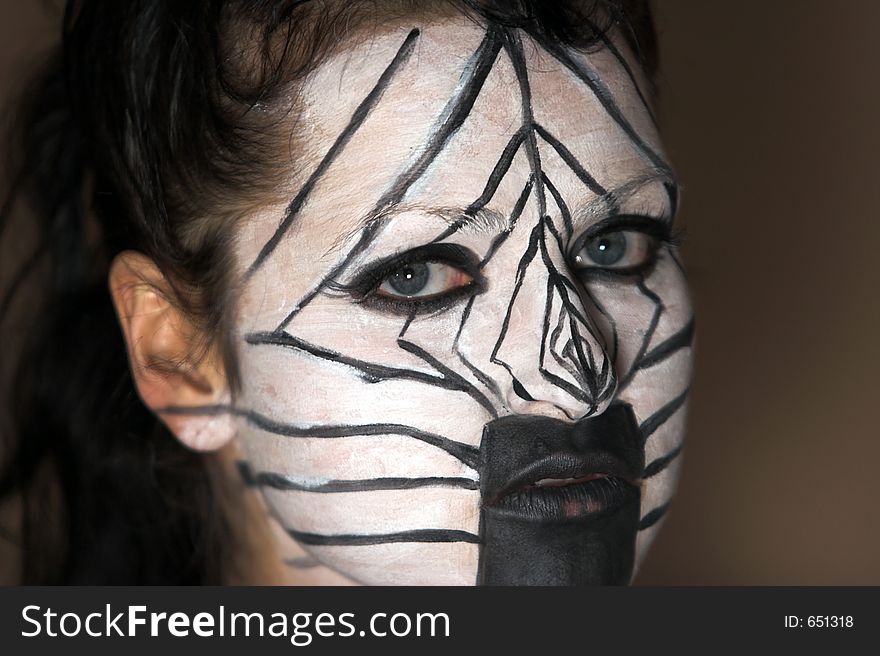 Portrait of the girl in zebra style makeup