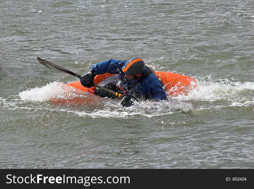 Kayaker practicing recovery from roll over. Kayaker practicing recovery from roll over