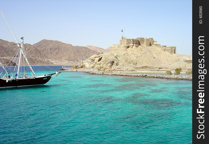 Snorkel boat moored by the old fort. Snorkel boat moored by the old fort