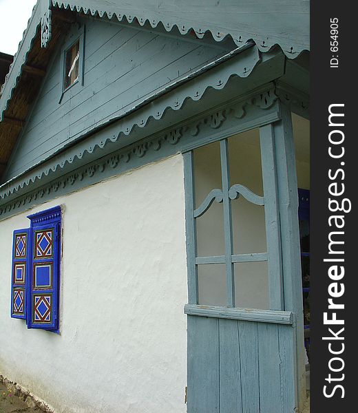 House with blue painted window. House with blue painted window