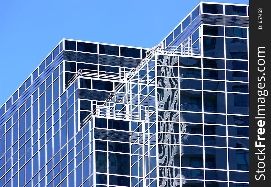 Skyscrapers look like glass blocks up close.