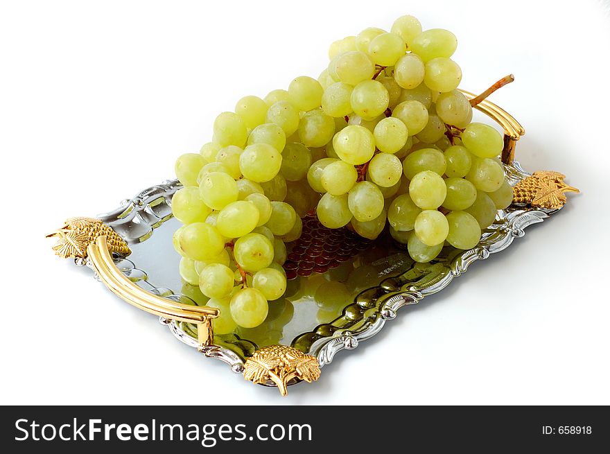Green grapes on metal tray. Green grapes on metal tray