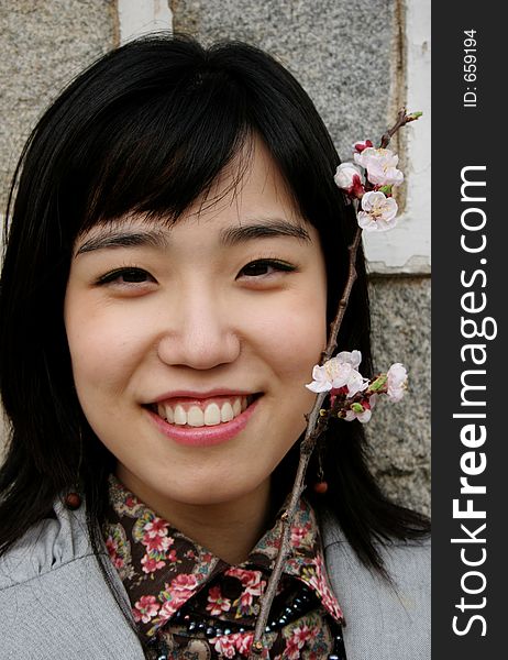 Korean girl with cherry blossoms. Korean girl with cherry blossoms