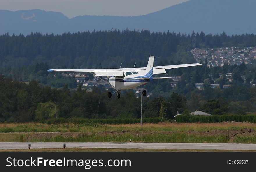 Plane landing at local airport. Plane landing at local airport