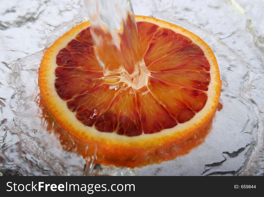 Orange slice in water