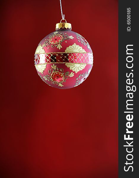 Christmas ornament isolated on red