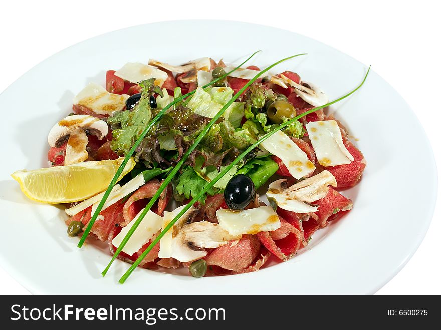 Appetizer with fish fillet, mushrooms salad
