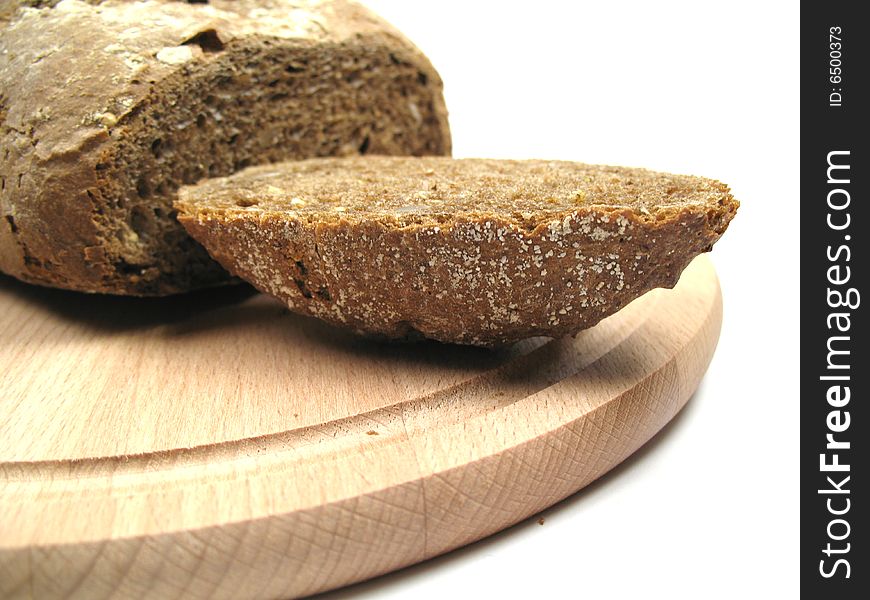 A slice of whole wheat bread. A slice of whole wheat bread