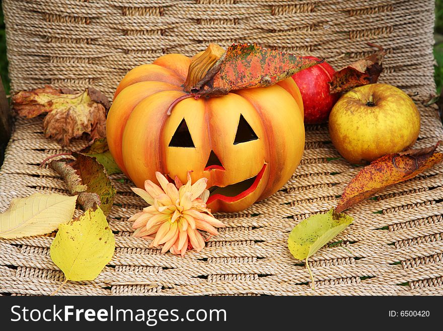 Halloween pumpkin with fruit and leaves. Halloween pumpkin with fruit and leaves.