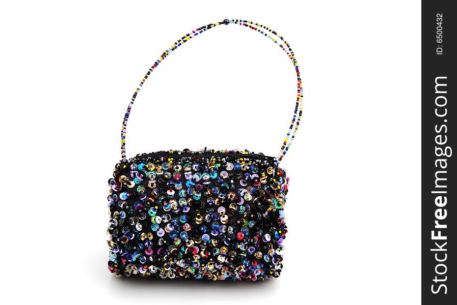 Shot of a pretty multi coloured sequinned bag. Shot of a pretty multi coloured sequinned bag