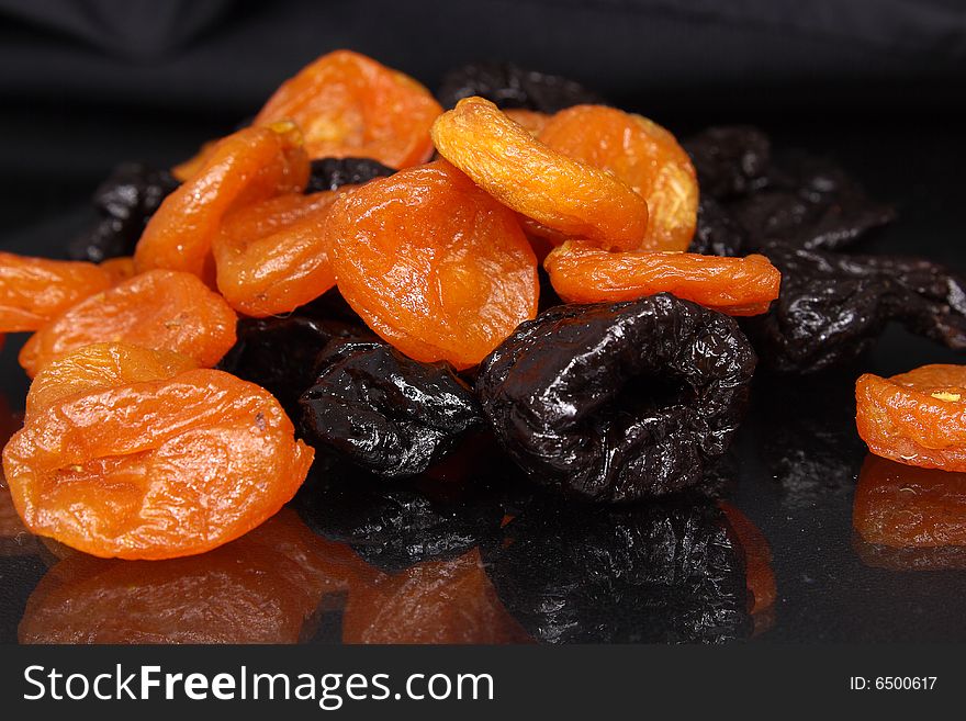 Sweet fruits on a dark background. Sweet fruits on a dark background