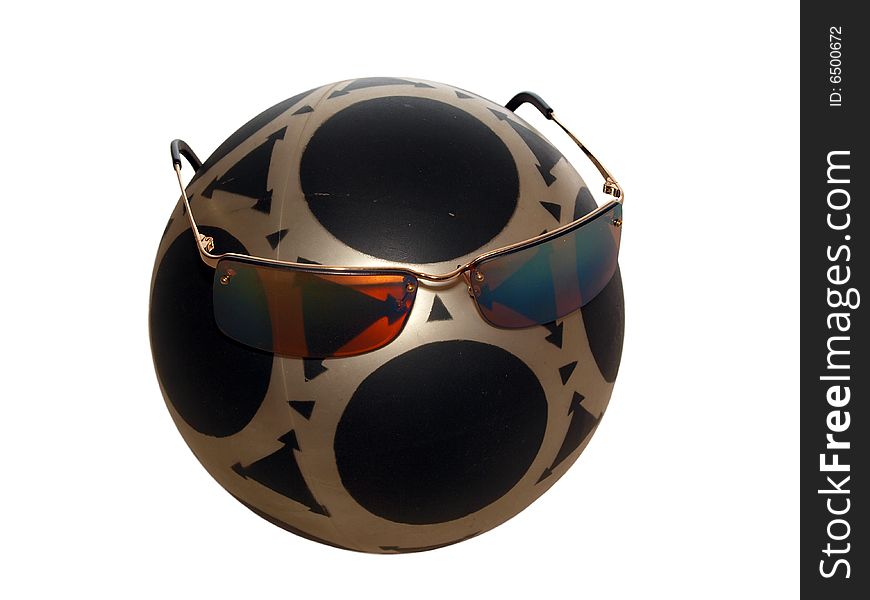 Mysterious rubber Ball wearing a pair of bronze sunglasses picture two. Mysterious rubber Ball wearing a pair of bronze sunglasses picture two