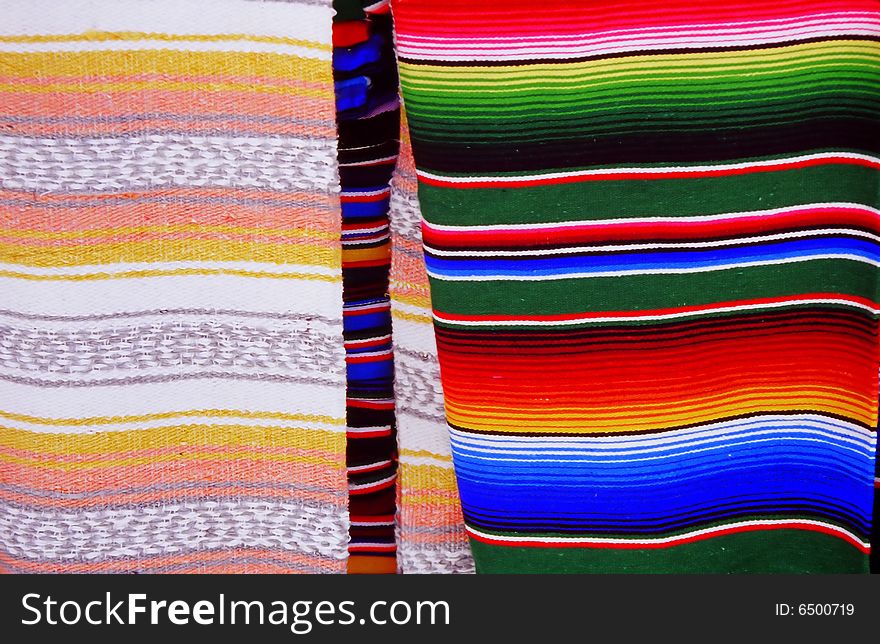 Mexican blankets in a market in mexico.