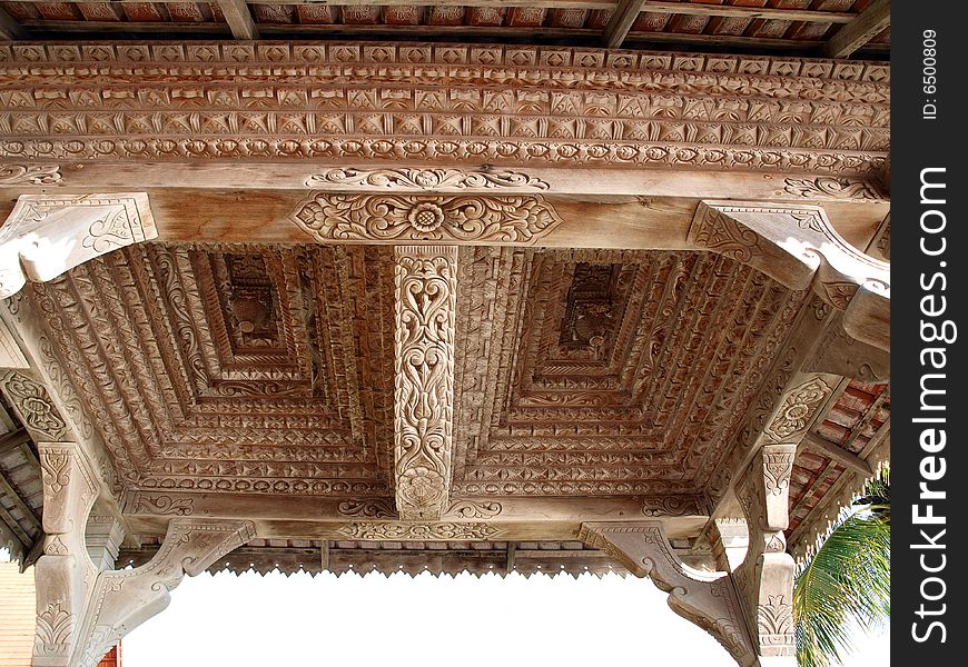 Ornate roof carving of traditional resting platform on holiday island. Ornate roof carving of traditional resting platform on holiday island