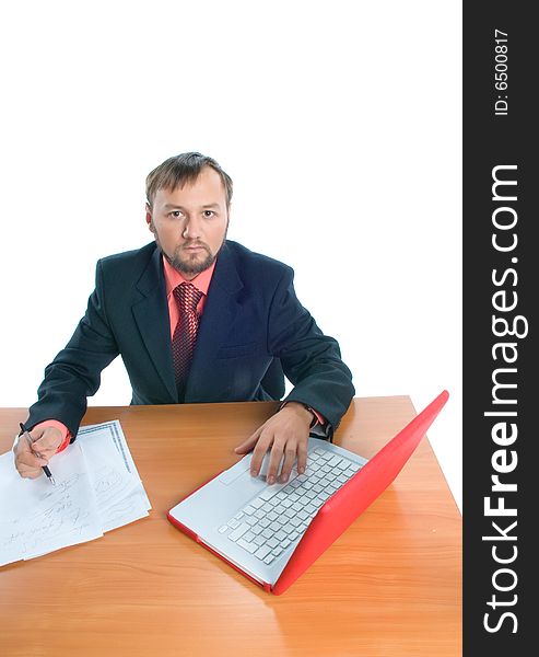 A businessman sitting at his table. A businessman sitting at his table