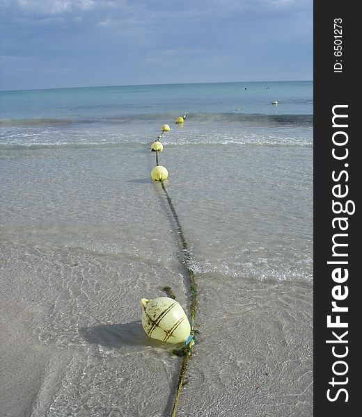 Rope whit floating balls, in a tropical sea. Rope whit floating balls, in a tropical sea