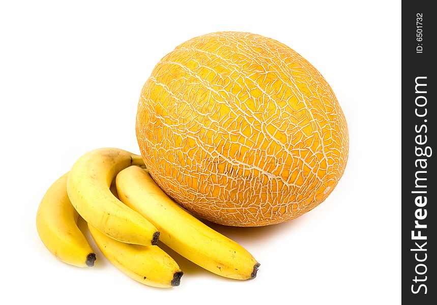 Yellow bananas and ripe melon on white background. Yellow bananas and ripe melon on white background