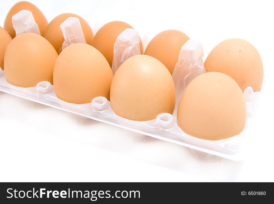 Eggs in box isolated on white