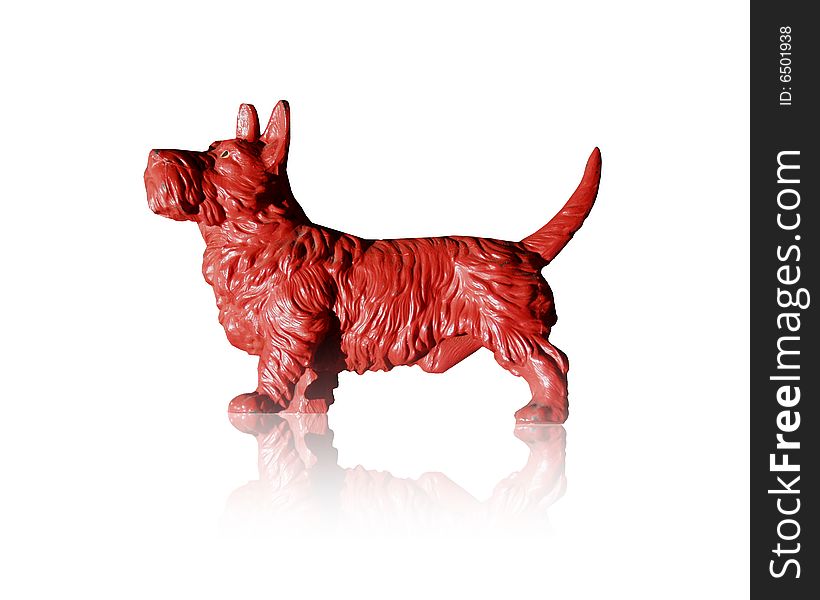 Small statue of a dog on a white background with a reflection. Small statue of a dog on a white background with a reflection.