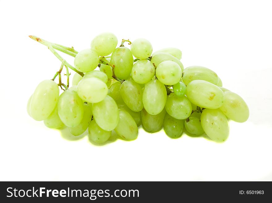 Green grapes isolated on white