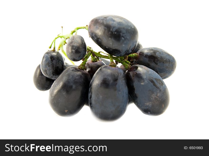 Black grapes isolated on white