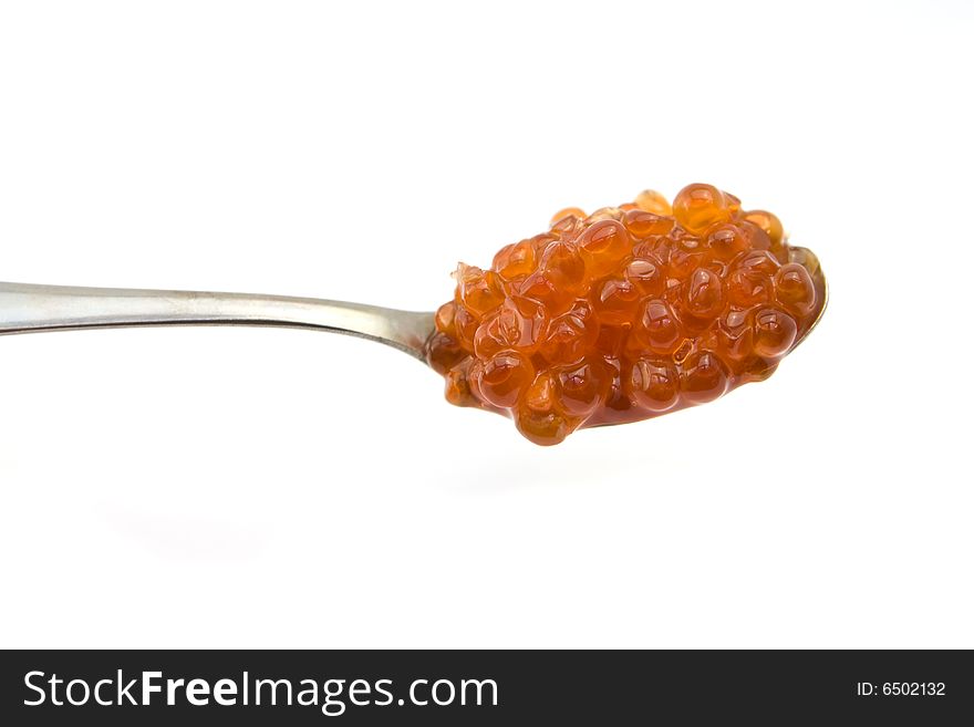 Caviar in spoon isolated on white