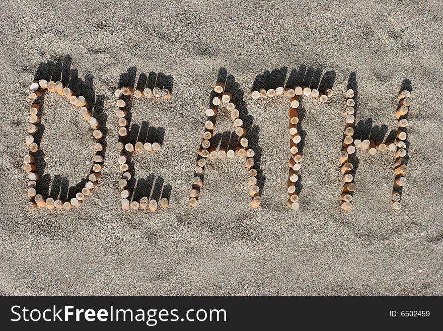 The word DEATH written with cigarette buds
