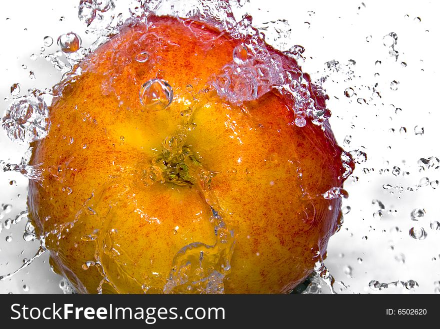 Fresh apple with water splash.