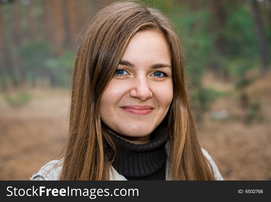 Beautiful girl looking aside outdoor