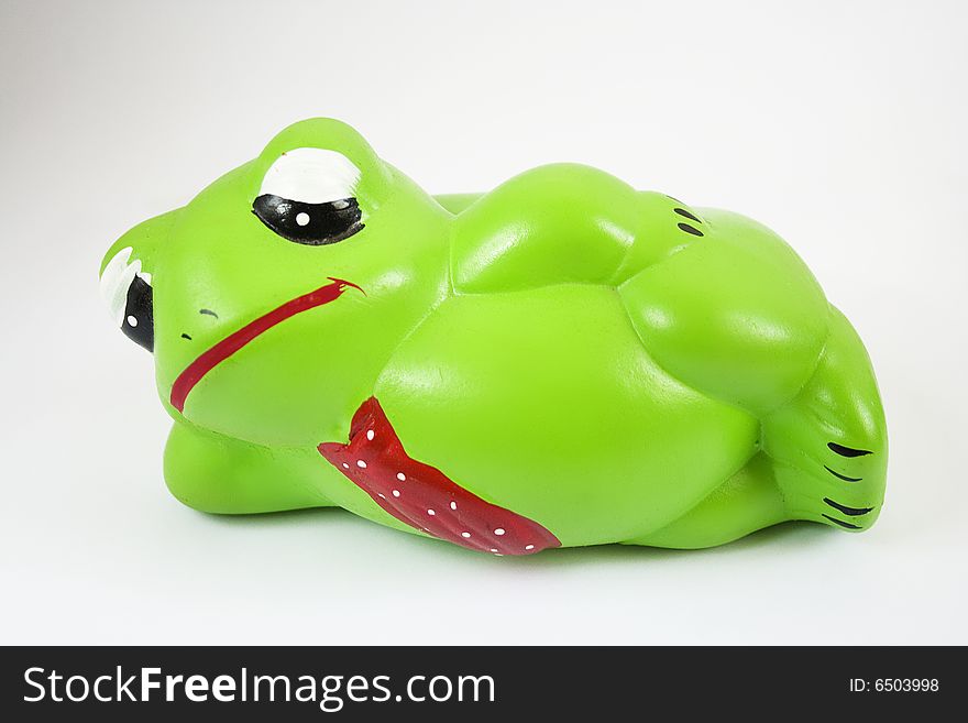 Ceramic made frog in lazy position. Ceramic made frog in lazy position.