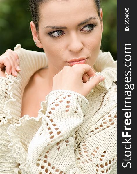 Portrait of beautiful woman in park