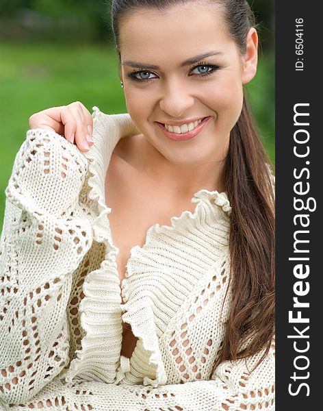 Portrait of beautiful woman in park