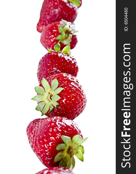 Strawberry pile on a white background