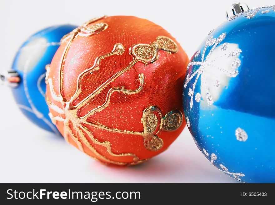 Beautiful gold and blue ball against the white background. Beautiful gold and blue ball against the white background