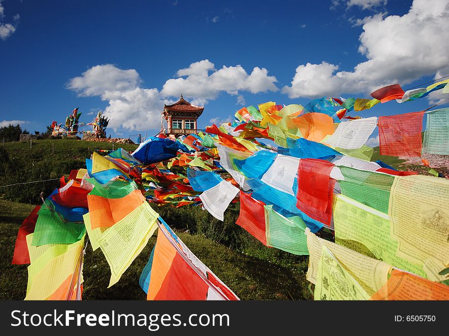 China, Tibet, the Buddhist scriptures written on the flag, the Lord Buddha on the expression of religious faith. China, Tibet, the Buddhist scriptures written on the flag, the Lord Buddha on the expression of religious faith