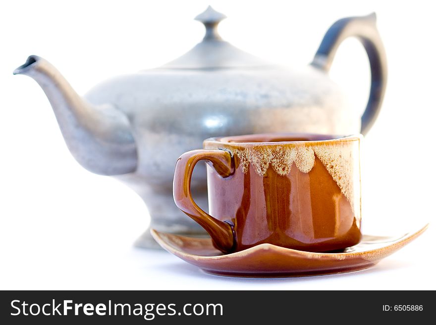 Kettle and pip-kin tea isolated on white background