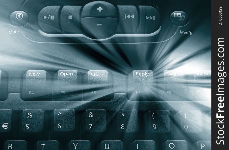 Media computer keyboard overlaid with streak effect. Media computer keyboard overlaid with streak effect