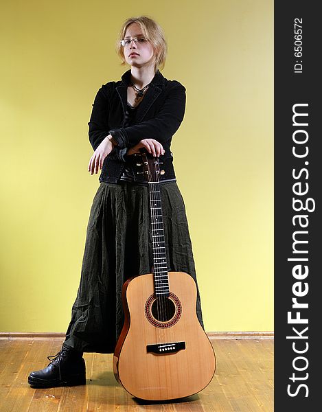 Young girl with acoustic guitar. Young girl with acoustic guitar