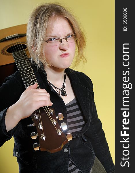 Young girl with acoustic guitar. Young girl with acoustic guitar