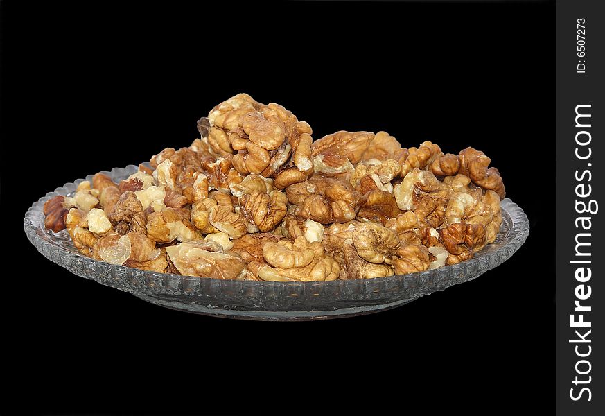 The cleared walnuts on a black background