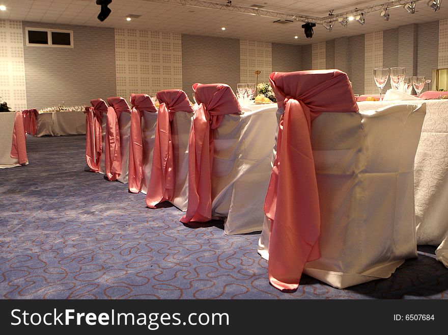 Many chairs in a wedding ballroom