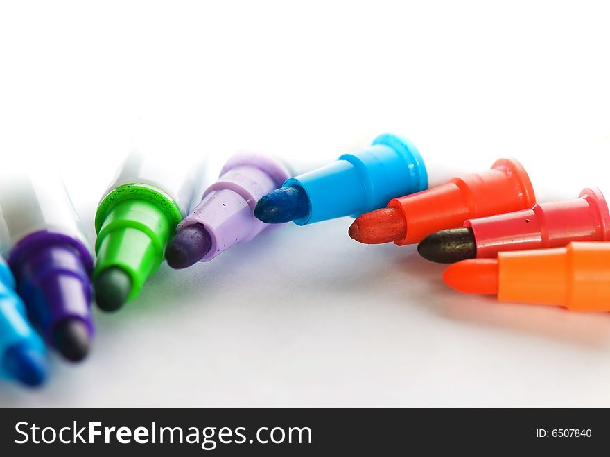 Colourful markers arranged in a spiral manner. Colourful markers arranged in a spiral manner