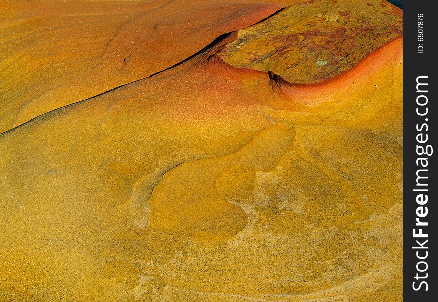 Colored rockformation in Sydney National Park in Australia, usable as a background. Colored rockformation in Sydney National Park in Australia, usable as a background