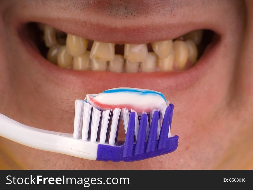 Person Brushing Teeth