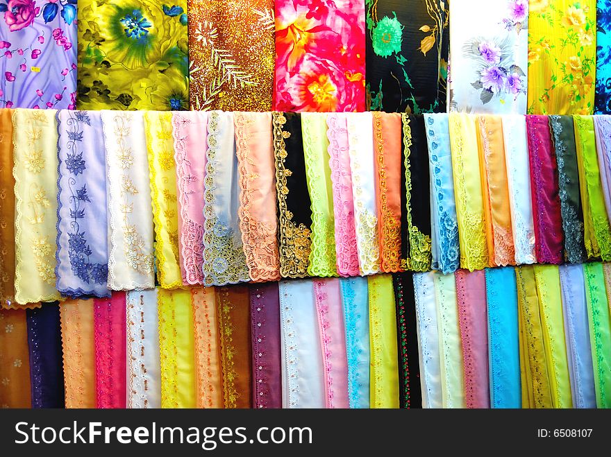 Colourful Fabrics For Sale In A Textile Shop.
