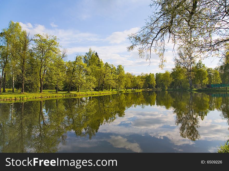 Landscape with blue sky, clouds, forest and lake. Landscape with blue sky, clouds, forest and lake