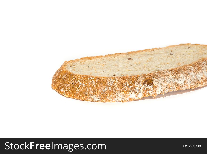 Slice of fresh wholegrain bread on white background