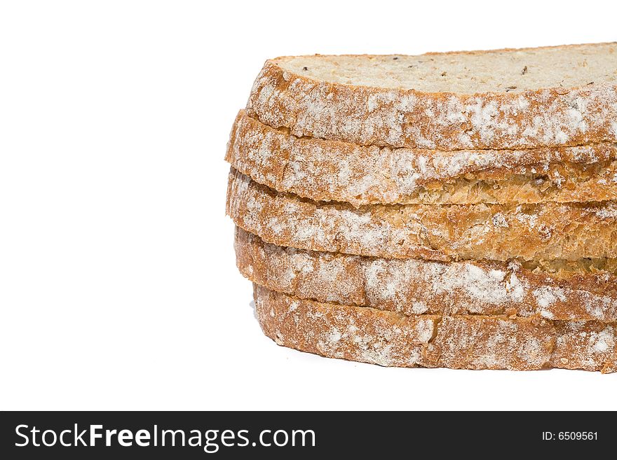 Slices of fresh wholegrain bread on white background