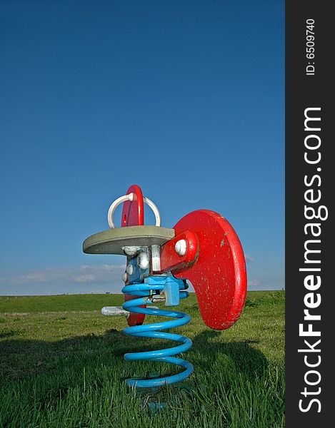 Low close up of an empty and deserted seesaw